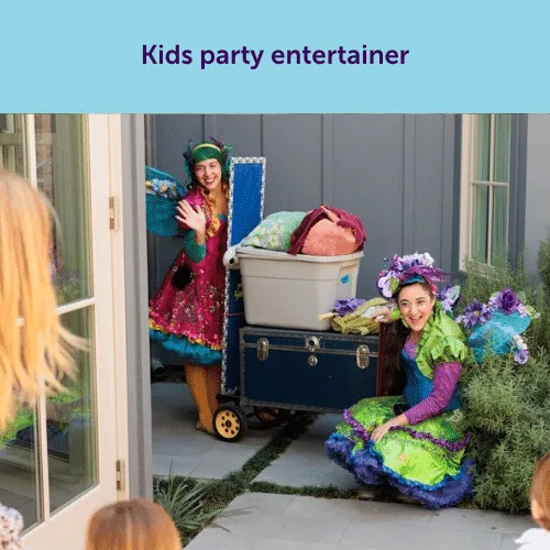 Two cheerful children's party entertainers in colorful faerie costumes arriving with supplies, ready to save the day at a rained-out party.