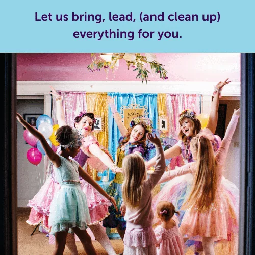 Happily Ever Laughter entertainers dancing with children at a colorful indoor party: we bring, lead, and clean up everything for you.
