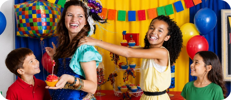 A performer leading a group of delighted children in a party activity.