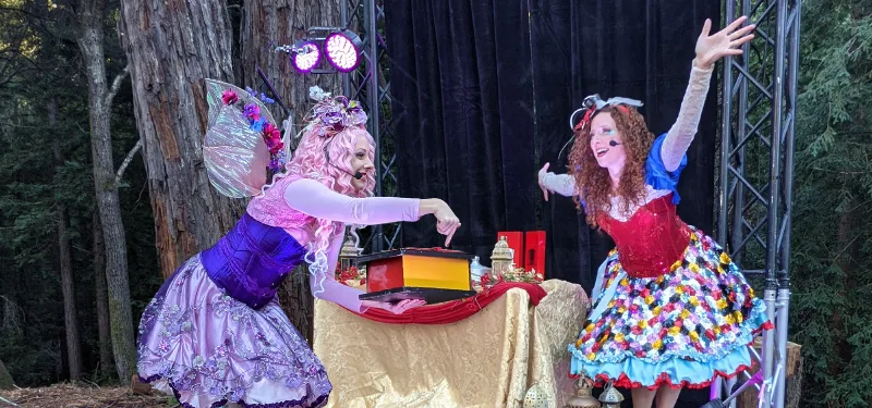 A performer leading a group of happy children at a recurring event.